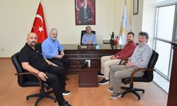 Didim’den Yu­na­nis­tan’a Göç Eden Mü­ba­dil­le­rin To­run­la­rı Didim Ti­ca­ret Oda­sı­nı Zi­ya­ret Etti